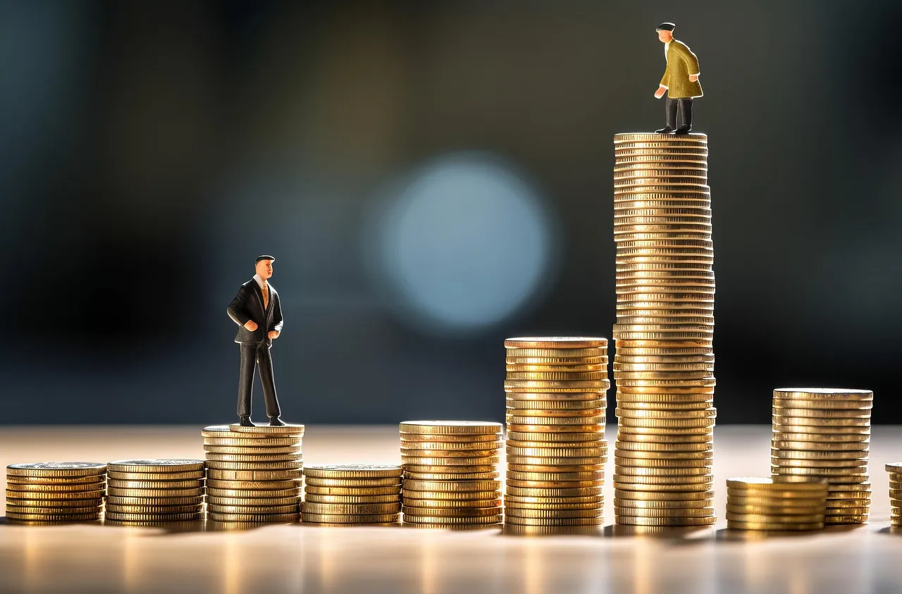 Miniature figures standing on stacks of coins, representing financial growth and investment success.