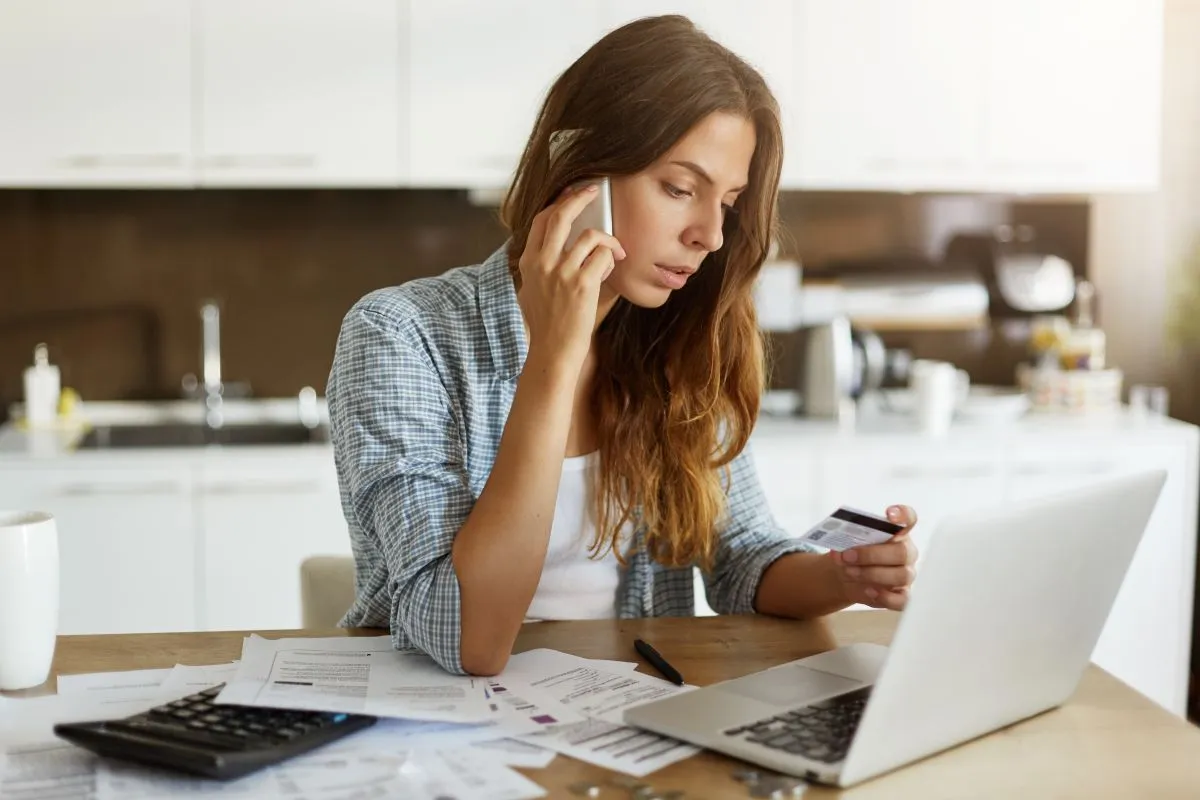 young woman checking her budget doing taxes
